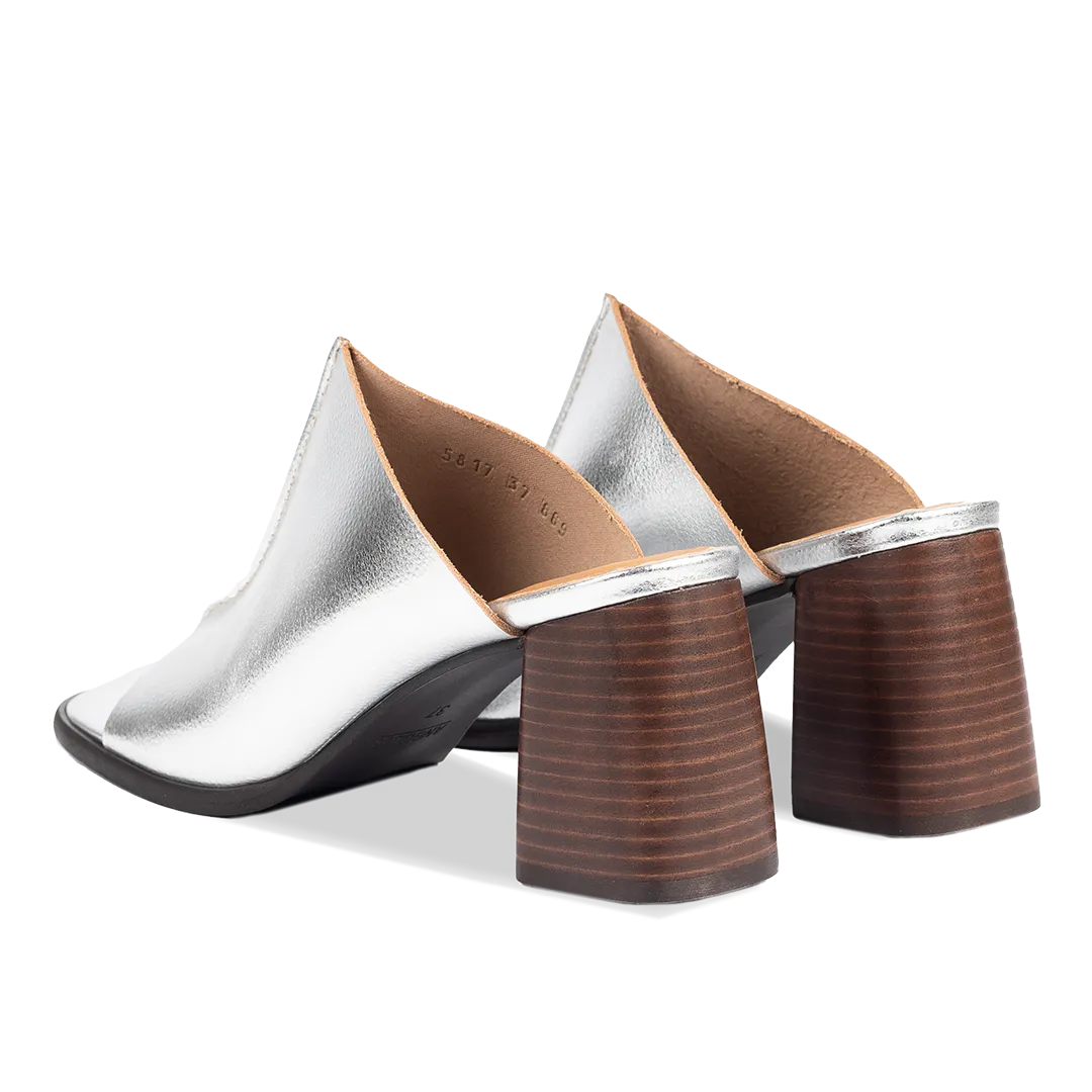 Mule with sculptural heel