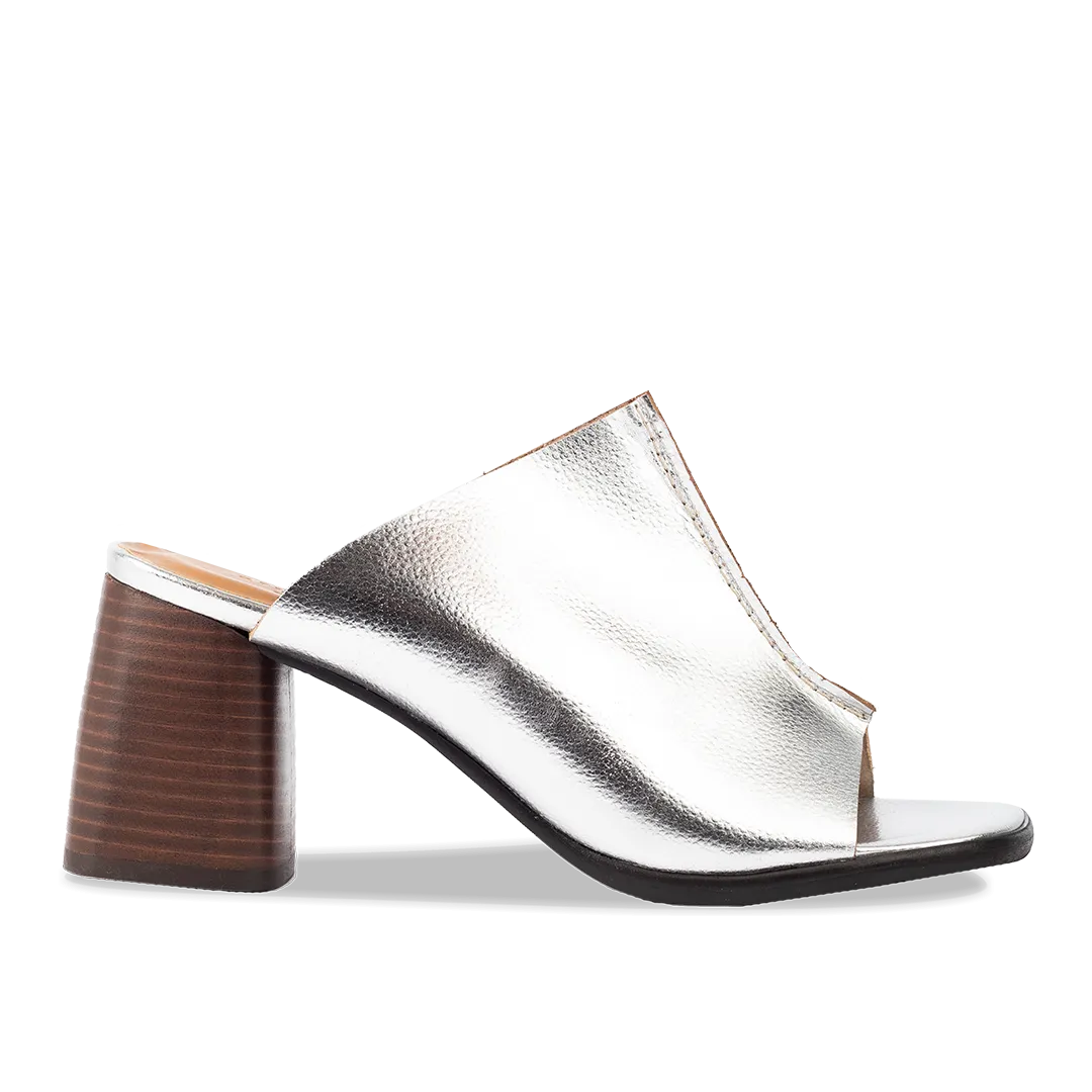 Mule with sculptural heel
